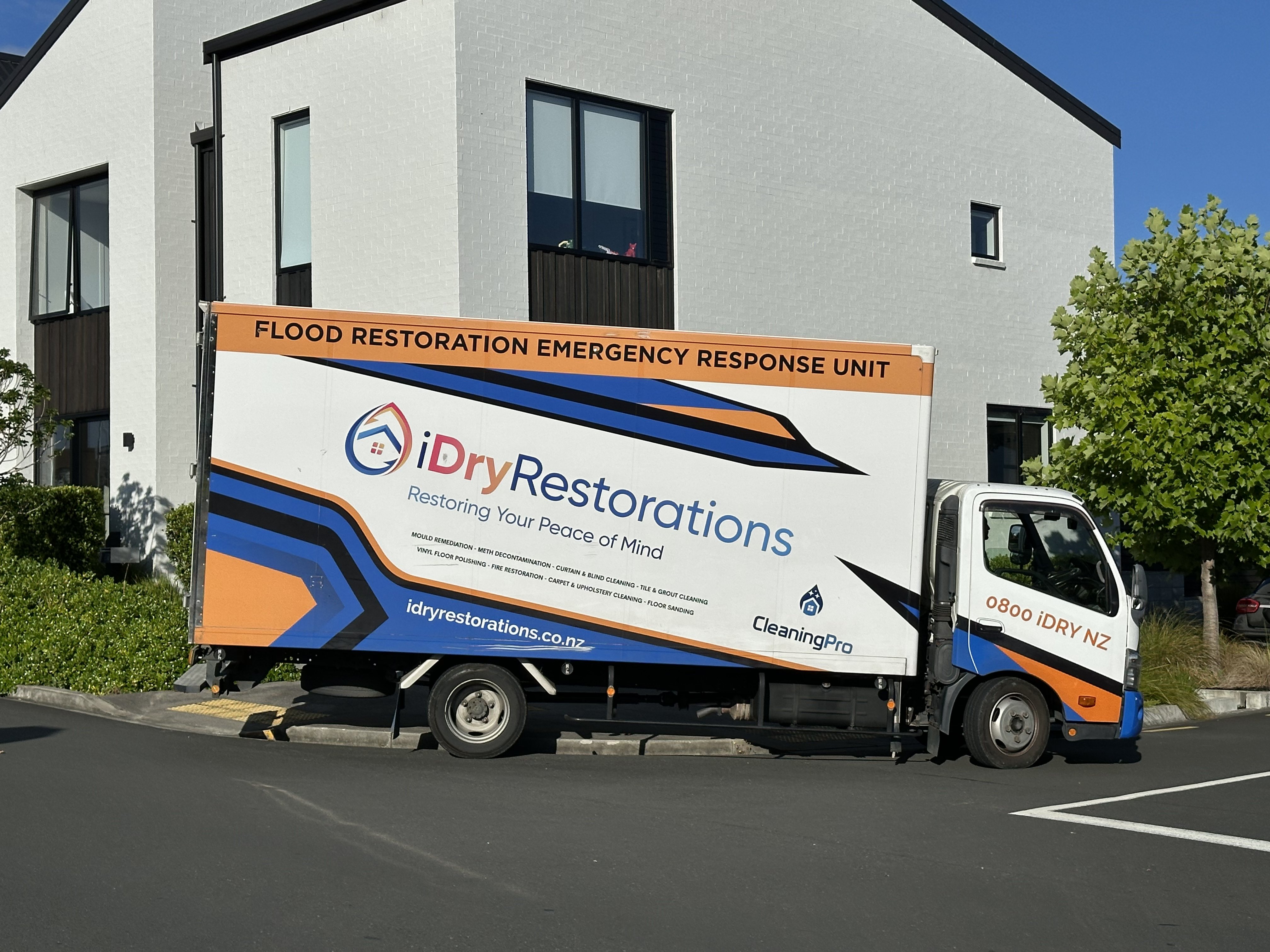 iDry Restorations branded flood restoration emergency response truck in Auckland