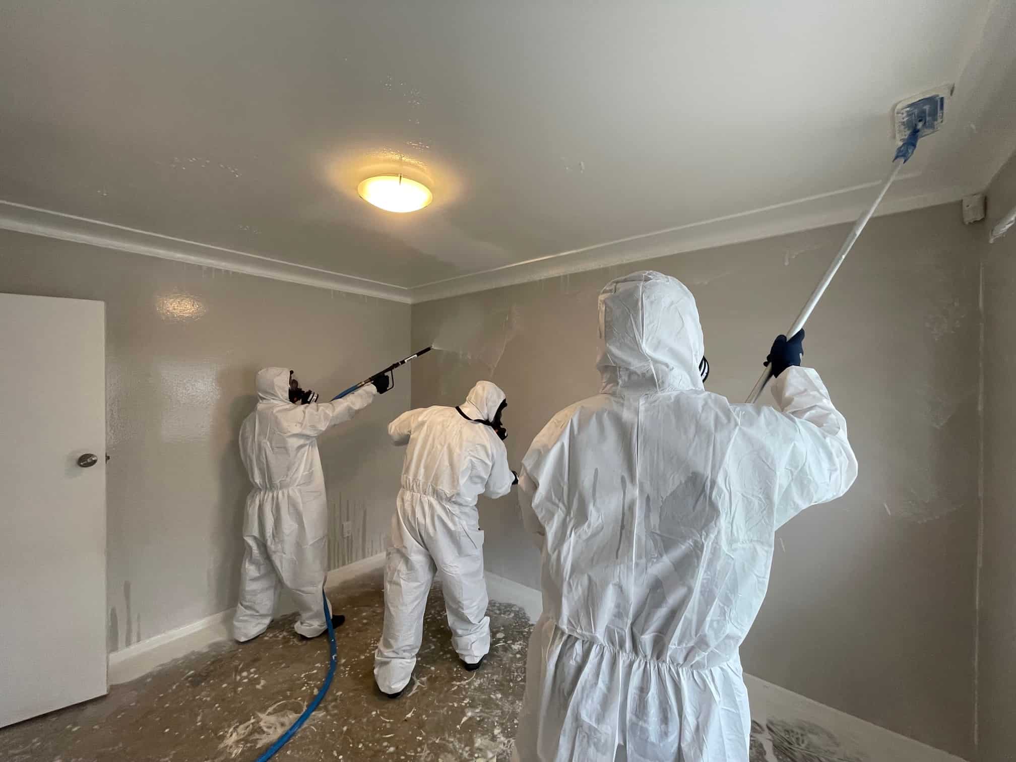 iDry decontamination team cleaning walls and surfaces in meth-contaminated Auckland property